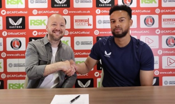 Jojo Wollacott (right) after signing the contract