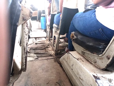 This vehicle is so rickety that some passengers got drenched when it rained.