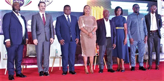 David Ofosu-Dorte (left), Senior Partner, AB & David Law Firm; Jeff Gable (2nd from left), Chief Economist, Absa Global; Prof. Peter Quartey (3rd from left), Director, ISSER; Vivian Lokko (4th from left), Head of News, Citi TV; Dr Yaw Ansu (4th from right), Senior Policy Advisor, Ministry of Finance; Dr Ama Fosuaa Fenny (3rd from right), Senior Research Fellow, ISSER; Dr Humphrey Ayim (2nd from right), President, Association of Ghana Industries, and Benard Avle (right), General Manager, Citi TV, after the lecture. Picture: ERNEST KODZI