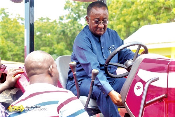 Dr Owusu Afriyie Akoto, Minister of Food and Agriculture, testing one of the tractors Dr Owusu Afriyie Akoto, Minister of Food and Agriculture, testing one of the tractors