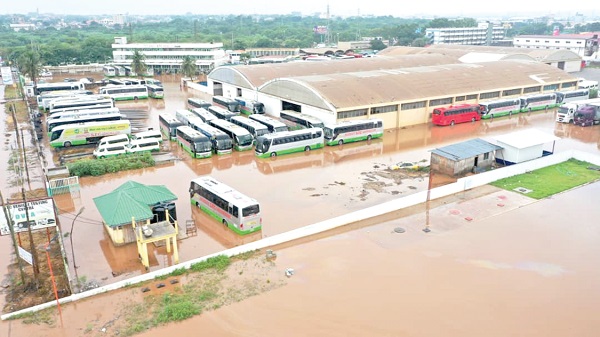 Some buses at the STC Yard in Accra submerged in water Some buses at the STC Yard in Accra submerged in water