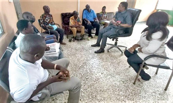 Kobby Asmah (2nd from right) engaging with Central Region-base vendors of the Graphic brand Kobby Asmah (2nd from right) engaging with Central Region-base vendors of the Graphic brand