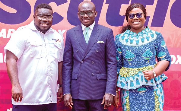 Godfred Yeboah Dame (middle), Attorney-General and Minister of Justice, with Ama Pomaa Boateng (right), Deputy Minister, Communications and Digitalisation, and Bice Kuffuor, MD, Ghana Post after the launch