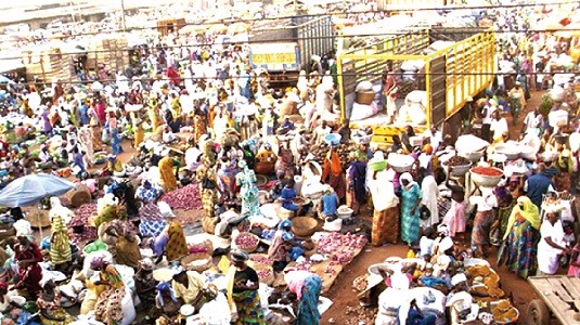 A market place with hordes of traders and buyers A market place with hordes of traders and buyers