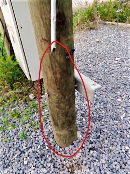 One of the vandalised poles that holds the earth wire 
