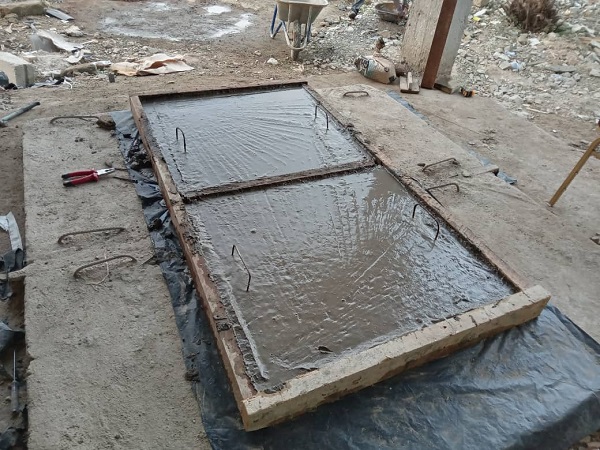 Slabs to cover newly constructed biodigester
