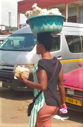  A hawker selling ayigbe biscuits
