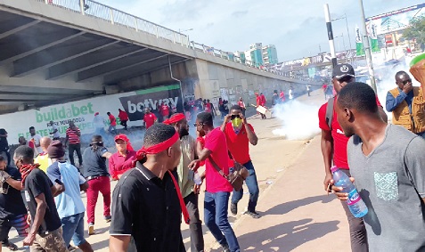 The police using tear gas to disperse some demonstrators