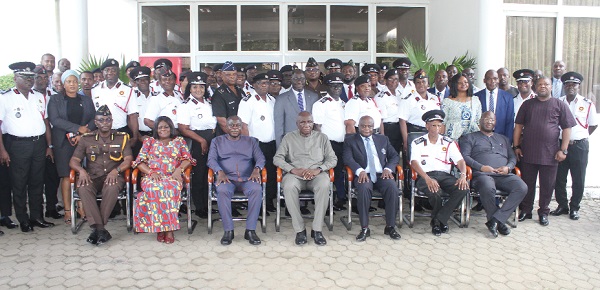 Ambrose Dery (seated middle), Minister for the Interior, in a group photograph with Julius Aalebkure Kuunuor (seated 2nd-right), Chief Fire Officer, Ghana National Fire Service. With them are other fire officers and dignitaries. Picture: ERNEST KODZI