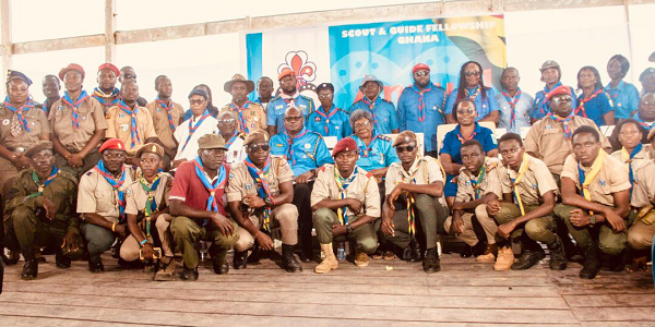 Members of the Scout and Guide posing with their leadership after their AGM