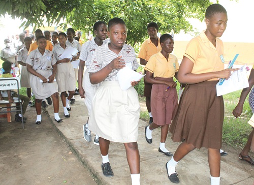 Some candidates on their way to an exam centre Some candidates on their way to an exam centre