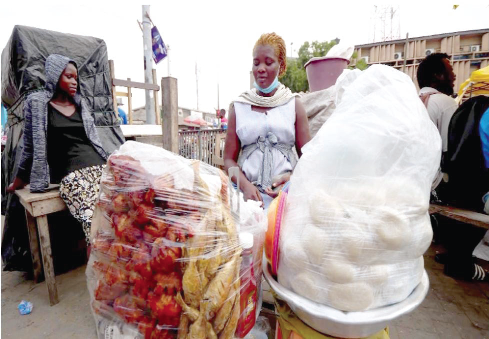 A banku seller readying herself to sell to the public