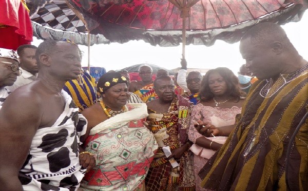 Mr Kwame Danso (right) handing over the keys of the new palace to Nana Akua Asantewaa. With them is Nana Amoa Daadom (left), Asene Gyaasehene. Pictures: Samuel Kyei-Boateng