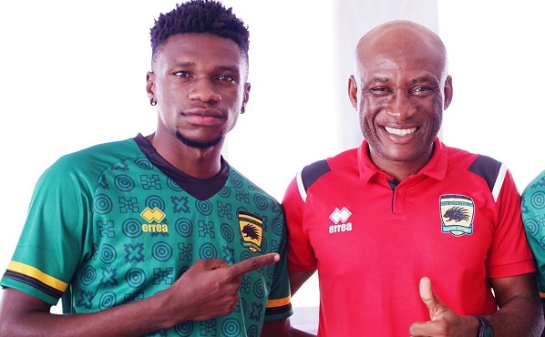 Etouga (left) with his coach Narteh Ogum