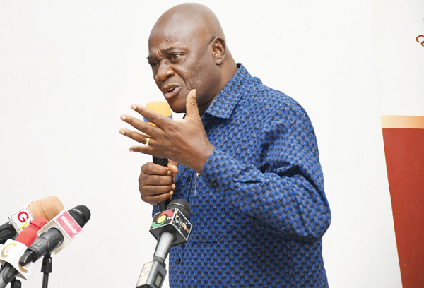  Dan Botwe (right), Minister of Local Government, Decentralisation and Rural Development, delivering his address. Pictures: EBOW HANSON