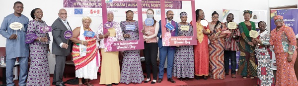Lariba Zuweira Abudu (5th from left), Deputy Minister for Gender, Children and Social Protection; Francisca Oteng Mensah (6th from left), Chairperson of the Parliamentary Select Committee on Gender; Elizabeth Sackey (6th from right), Chief Executive Officer of Accra Metropolitan Assembly; Irchad Razaaly (8th from right), European Union Ambassador to Ghana, and other dignitaries with informative placards after the event.   Picture: EDNA SALVO-KOTEY