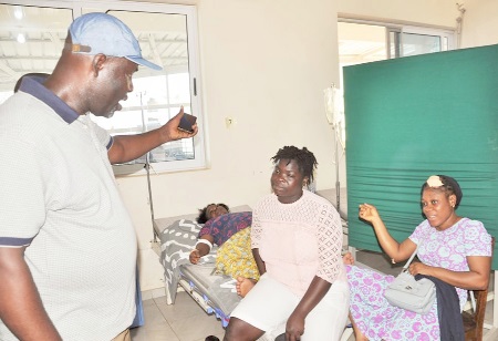 Divine Richard Bosson, the Ho Municipal Chief Executive, visited some women who were injured during the storm, at the hospital