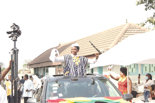 Rose Edudzi Kpormatsi of the Finance and Audit Unit of the company, mimicks Kwame Nkrumah on her arrival to declare the Independence of Ghana in the mock session 