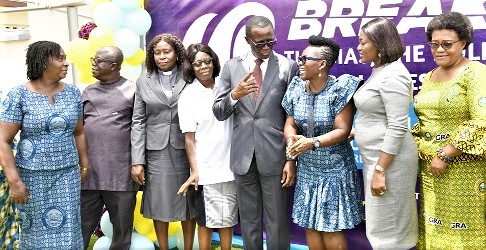 Rev Ammishaddai Owusu-Amoah, Commissioner-General of GRA, interacting with Ms Vivien Ne-ormah Nyoni after the function. Picture: EBOW HANSON