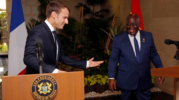 File Photo: French President Emmanuel Macron speaks with Ghana’s President Nana Akufo-Addo (R) as he arrives at the Presidential palace on November 30, 2017. (Photo: Philippe Wojazer/AFP/Getty Images) 