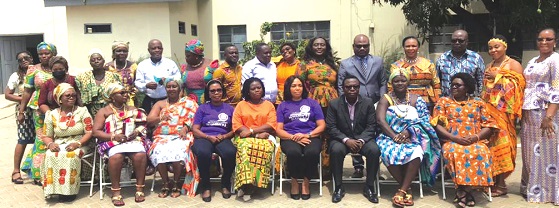 Martin Adu-Owusu (seated 3rd from right), MD of NTC, with some members of the Times Ladies Association
