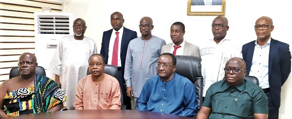 Dr Owusu Afriyie Akoto (seated 2nd right), Minister of Food and Agriculture, with the National Seed Council board members after the inauguration ceremony. Picture: GABRIEL AHIABOR
