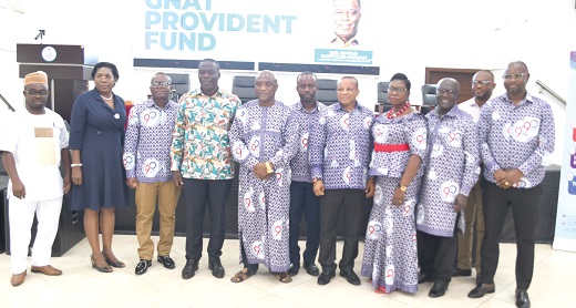 Ignatius Baffour Awuah (4th from left), Minister of Employment and Labour Relations, with members of the board of trustees of GNAT  Provident Fund 