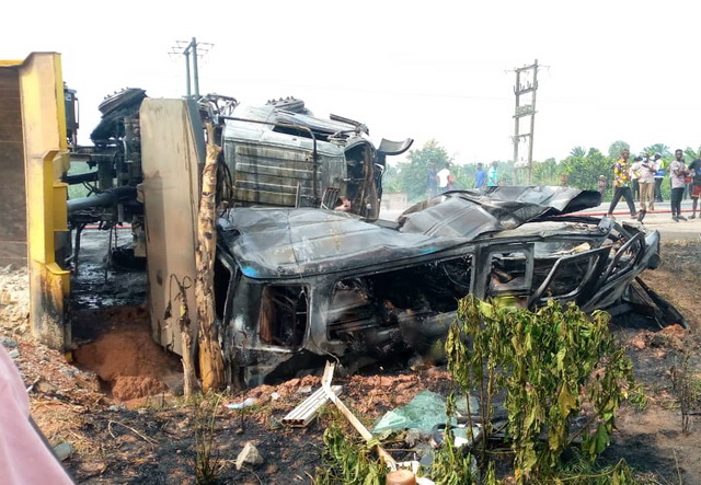 The charred vehicles at the accident scene. (The images have been edited to cover bodies of the victims trapped in the mini bus