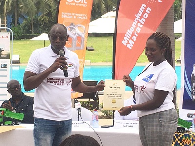 CEO of the GAA, Mr  Bawah Fuseini with Director of event, Catherine Morton displaying the gold label certificate