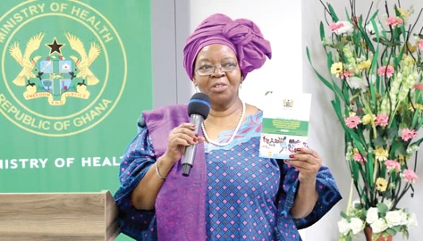Prof. Sheila Tlou, a former Botswanan Minister of Health, displaying the policy document at the launch