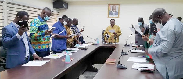  Dr Owusu Afriyie Akoto (head of table) swearing the board members of the Grains and Legumes Development Board