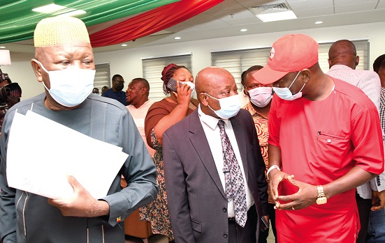 Kwaku Agyeman-Manu (2nd from left), Minister of Health, interacting with David Kwesi Afreh (right), Board Chairman of Stop TB Partnership Ghana, during the  commemoration of World TB Day. With them is Alhaji Mahama Asei Seini (left), Deputy Minister of Health. Picture: EBOW HANSON
