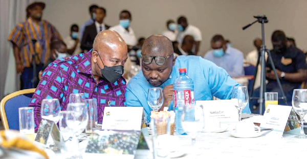 Francis Asenso-Boakye (right), Minister, Works and Housing, interacting with Patrick Ebo Bonful, President, Ghana Real Estate Developers Association, during the association’s CEOs Breakfast Meeting in Accra