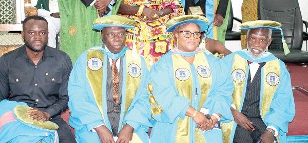 Yaw Bediako Sampong (left), son of Ernest Bediako Sampong, who received the award on behalf of his father; Dr Barfuor Adjei-Barwuah (2nd from left),  Grace Amey-Obeng (3rd from left) and Prof. Stephen Adei. Picture: MAXWELL OCLOO 