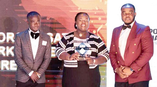 Stephen Apraku (left), an officer of the Accounting Dept; Dorcas Bonney (middle), HR Assistant Manager and Michael Osei, Administrative Specialist,  all of Karpowership Ghana displaying the award