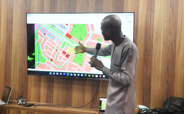 Benito Owusu-Bio (left), a Deputy Minister of Lands and Natural Resources, briefing the media on the reconstruction of Appiatse.