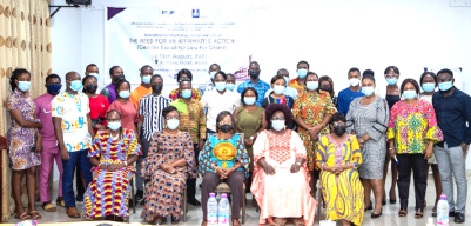 Charity Binka (seated 3rd from left), Executive Director, Women, Media and Change; Sheila Minka-Premo, Convenor, AA Bill Coalition, and some media personnel after a recent workshop on the bill