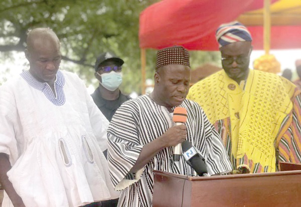 Zakaria Yidana (middle), the North East Regional Minister, addressing the event