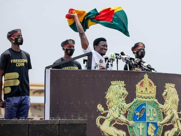 Jacob Caesar waves the Ghana flag as he hinted at his 