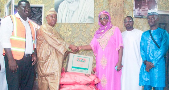 Emma Adwoa Appiah Osei-Duah, Director of Communications and Corporate Affairs (3rd from right), presenting some of the items to Alhaji Latif Abdulsalam, Head of Protocol at the National Chief Iman’s Office