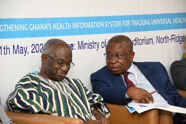 Kwaku Agyeman-Manu (right), Minister of Health, interacting with Dr Anarfi Asamoa-Baah, Presidential Co-ordinator of COVID-19 Response, during the openinsession of the National Health Sector Annual Summit 2022 at the Ministry of Health in Accra. Picture: EBOW HANSON