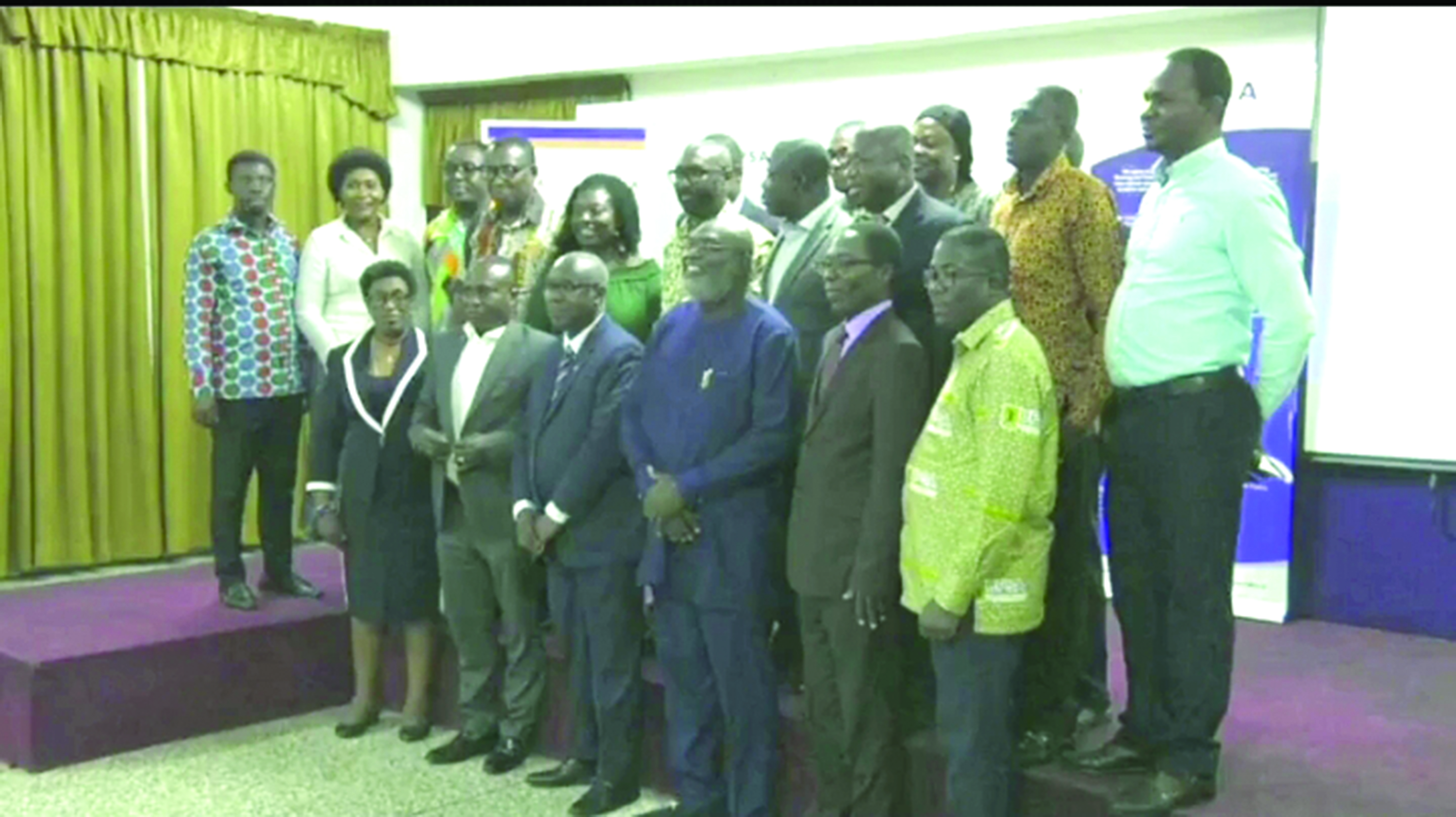 Kwadwo Mpeani Brantuo, (3rd from left) a Chartered Accountant and Senior Partner, Ernst & Young,with some members of the UPSA Global Alumni after the forum