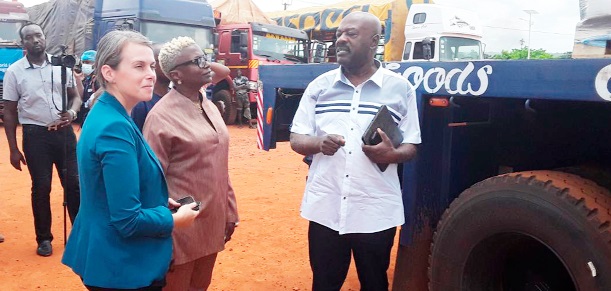 Barbara Clemence (left), WFP Country Representative, interacting with Sara Nicolls (middle), Director of Development Programme, Canadian High Commission in Ghana, and Tom Gambrah, CEO of Premium Foods Limited