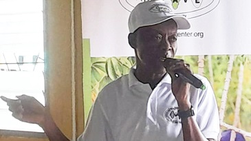 Dr Allen Oppong, a Senior Research Scientist at the Crop Research Institute, addressing the cassava farmers