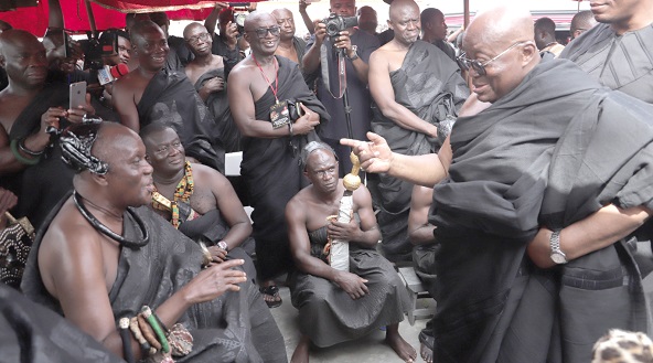 President Akufo-Addo consoling Nana Otuo Siriboe  II, Chairman of the Council of State, at the funeral grounds