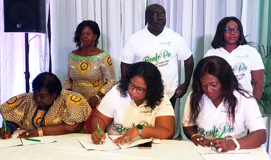  Joyce Lamptey (left), President of NABH, Solace Odamtten Sowah (middle), General Manager, Operation; Enterprise life and Adwoa Acquah (right), Managing Director,  Westom Insurance Brokers signing the agreement. Picture: JEMIMA O. ADDAE