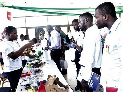 Some learners taking participants through the Stemrobo Program after the event. Picture: EDNA SALVO-KOTEY
