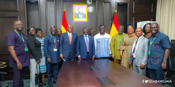 Vice-President  Bawumia (middle) with members of the National Pensions Regulatory Authority delegation. Among them is Ignatius Baffour-Awuah (6th from left), Minister of Employment and Labour Relations 
