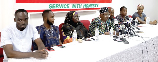 David A. Apasera (4th from left), Leader of the People’s National Convention, addressing participants in the media briefing. With him are members of the PNC. Picture: EDNA SALVO-KOTEY