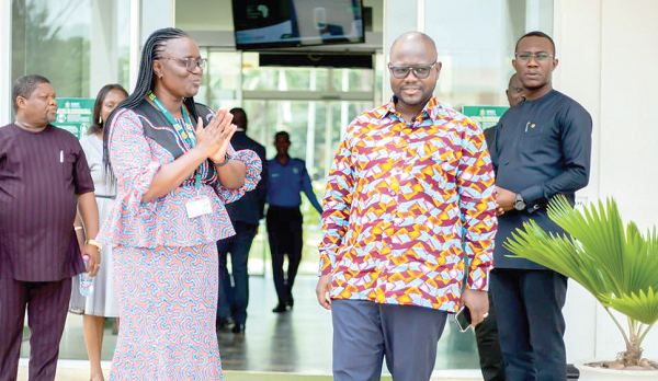  Francis Asenso Boakye (right), Works and Housing Minister, in a discussion with Rita Akosua Dickson 